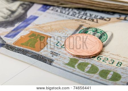 US Currency with coin.