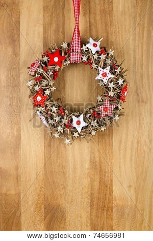 Decorated Christmas Door Wreath Red White Cloth Stars On Sapele Wood Background