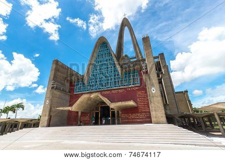 Unidentified people in front of basilica La Altagracia Church in Higuey Dominican Republic