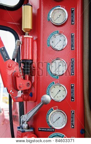 Meters or gauge in crane cabin for measure Maximun load, Engine speed , Hydraulic pressure