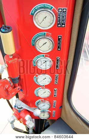 Meters or gauge in crane cabin for measure Maximun load, Engine speed , Hydraulic pressure
