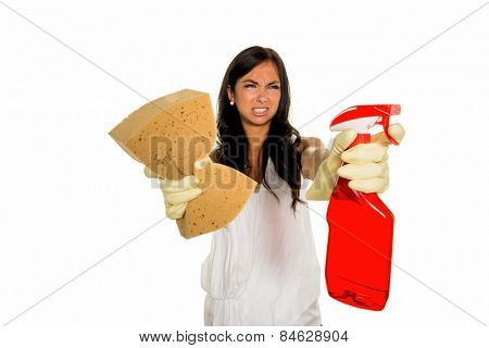 a young woman is annoyed that she has to make the house cleaning.