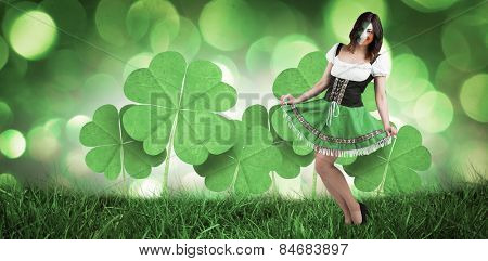 Irish girl smiling against green glowing background