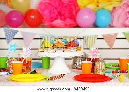 Prepared birthday table with sweets for children party