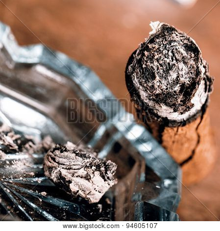 Expensive Hand-rolled Cigar On A While Background