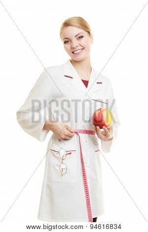 Doctor Specialist Holding Fruit Apple Measuring Waist