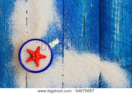 Shell Cup Sand Strewn Blue Boards