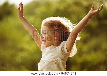 Happy And Cheerful Little Girl