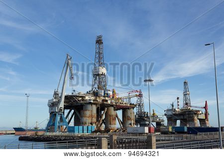 Gas and oil rig platform in the port, shipyard