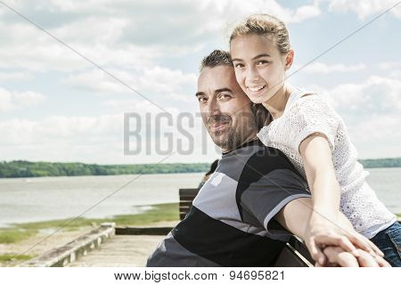 Father with his daughter at sea getting good time
