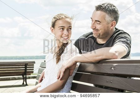 Father with his daughter at sea getting good time