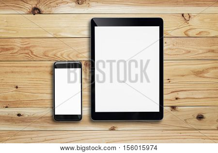 Tablet and smartphone on wood table. tablet white screen. tablet white display. tablet can connect to Wi-Fi. tablet to watch movies. tablet users play games. black color tablet