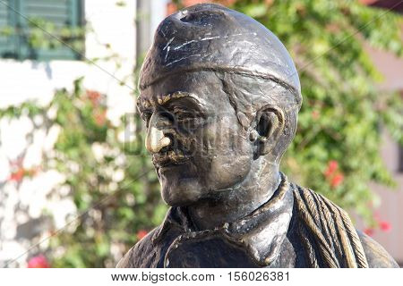 HERCEG NOVI, MONTENEGRO - 4 AUGUST 2016: monument to the chimney sweep on the street Njegoseva.