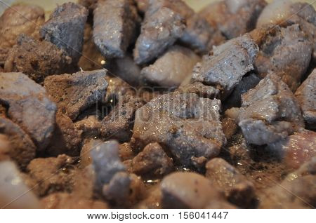 Afelia. Cypriot national dish of marinated and stewed pork in aromatic spices.