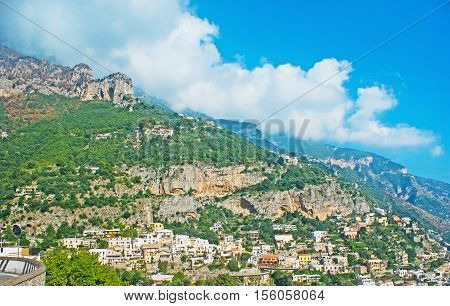 The villas of Positano on the rocky of Lattari Mountain Range Italy.