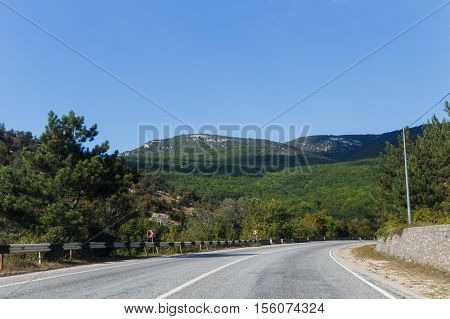 Winding road on background of mountain scener day