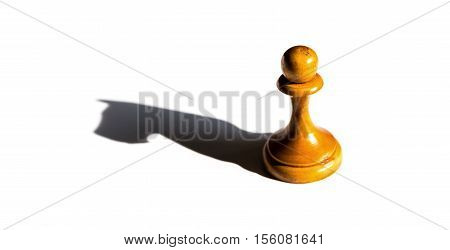 a chess pawn casting a knight piece shadow concept of strength and aspirations