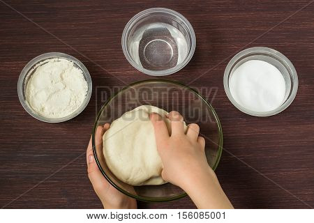 Making toys for Christmas decorations from salt dough with your own hands. Children's art project a craft for children. DIY concept. Step by step photo instructions. Step 1. Preparation of salt dough