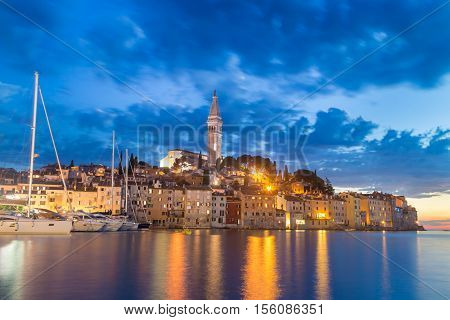 Coastal town of Rovinj, Istria, Croatia in sunset. Romantic Rovinj is a town in Croatia situated on the north Adriatic Sea Located on the western coast of the Istrian peninsula.