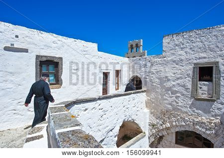 Patmos Greece - May 16 2010: Priests in the Agios Joannis Theologos Monastry