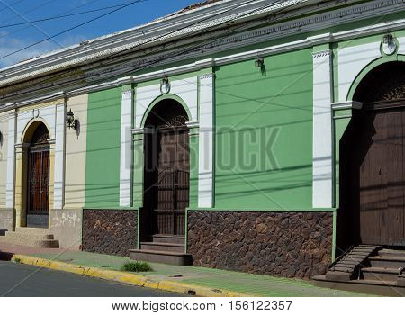 Simple and colorful colonial architecture in the historic center of Leon Nicaragua