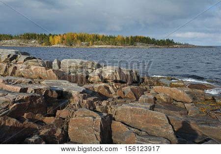 Rocky coast on White sea in autumn on Kola peninsula Russia