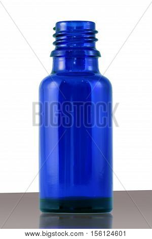 This is a blue medical bottle made of glass.
