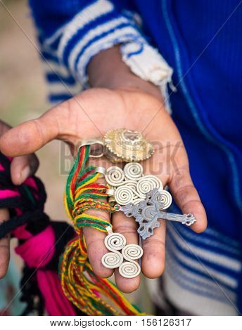 Crosses and other symbols sold as souvenirs by local children close to Axum Ethiopia.