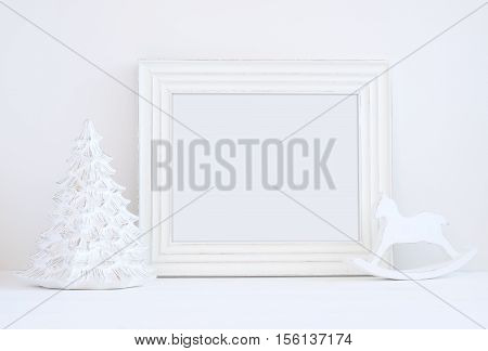 Christmas styled mockup landscape frame christmas tree and rocking horse overlay your business message promotion headline or design great for lifestyle bloggers and social media campaigns