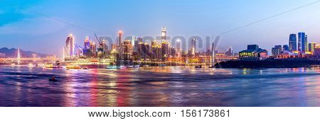 cityscape and skyline of downtown near water of chongqing at nightpanoramic.