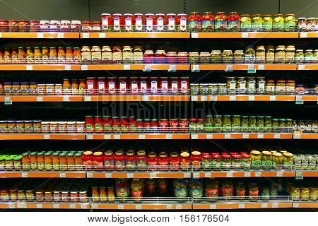 Chernihiv / Ukraine. 06 March 2016:store canned of cucumbers tomatoes and others on the counter of supermarket. 06 March 2016 in Chernihiv