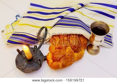 Shabbat Candles In Glass Candlesticks Isolated On Black.