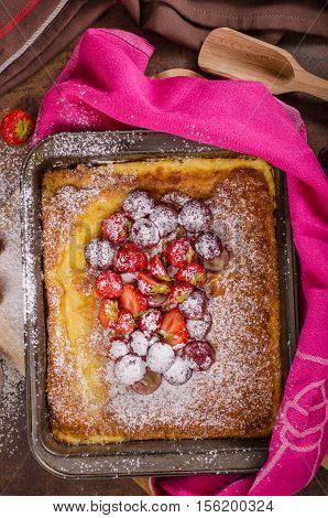 Pancake Cooking In A Plate With Fruit