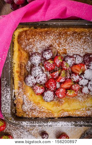Pancake Cooking In A Plate With Fruit