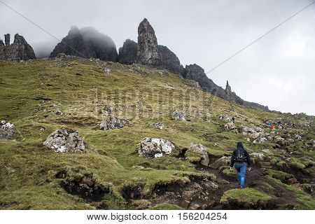 Girl Hiking the Old Man of Storr Isle Skye in Scotland UK