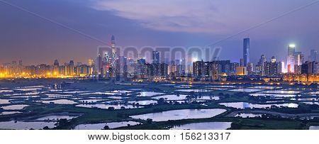 Shenzhen citscape at night , view from hiong kong countryside