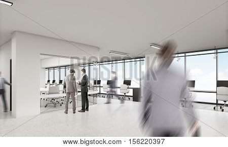 Businessmen in office with row of computers and conference room with rounded corner. Concept of modern workplace. 3d rendering.