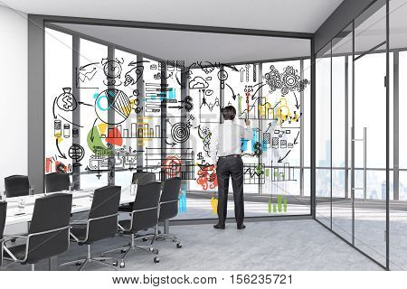 Rear view of a businessman drawing a sketch on a glassboard in a room with panoramic windows and a conference table. 3d rendering.