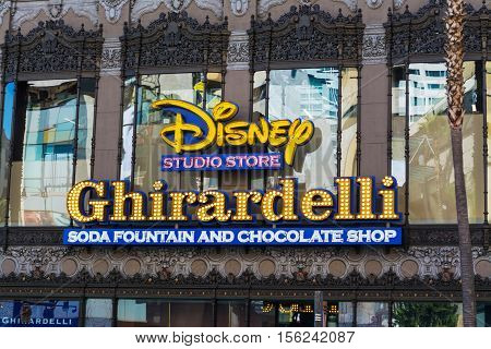 LOS ANGELES CALIFORNIA - NOVEMBER 02 2016: Disney and Ghirardelli signs in Hollywood boulevard California