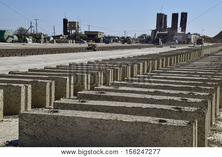 Cinder Blocks Lie On The Ground And Dried. On Cinder Block Production Plant.