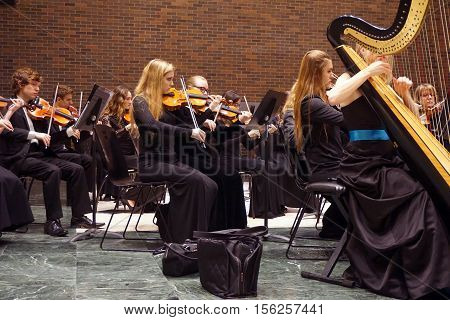 ROMEOVILLE, ILLINOIS / UNITED STATES - OCTOBER 26, 2016: The Metropolitan Youth Symphony Orchestra rehearses prior to a concert at Lewis University.