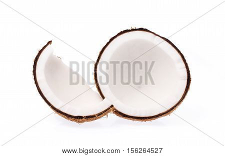 Old Brown Organic Coconut Fruit Copra Broken Into Pieces And Stacked On White Background