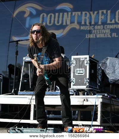 LAKE WALES, FL-NOV 4: Bass player Johnny Stanton of the Josh Thompson band performs at the CountryFlo Music and Camping Festival on November 4, 2016 in Lake Wales, Florida.