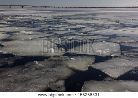 Ice floes on the river. Great Volga River.