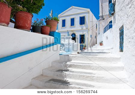 Nissyros, Greece - May 17, 2010: The steps to the square of the Nikia village on the volcano border