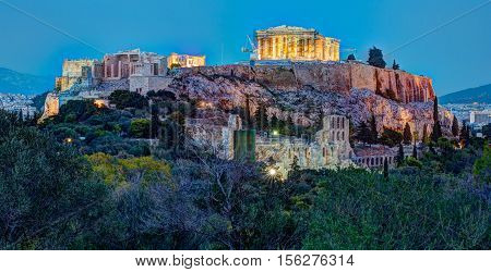 Parthenon and Herodium construction in Acropolis Hill in Athens, Greece shot in blue hour
