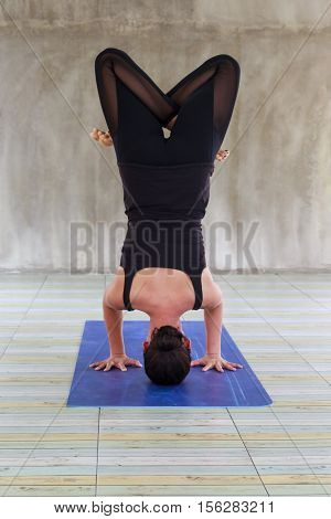 Women in yoga class in fitness studio