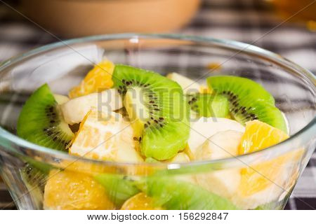 Delicious fruit salad in a glass bowl for diet