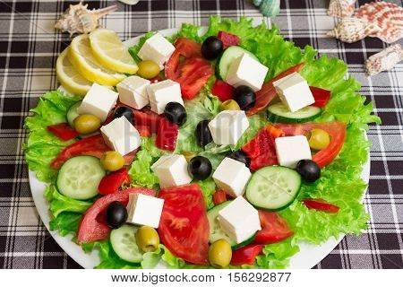 Greek salad with feta cheese and olives