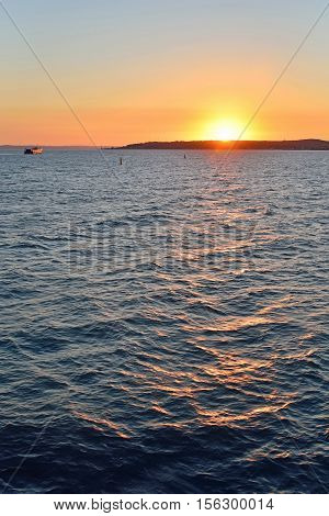 The View Of The Sunset Over The Crimea With A Ferry